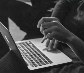 Laptop in woman's lap