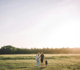 family walking in field