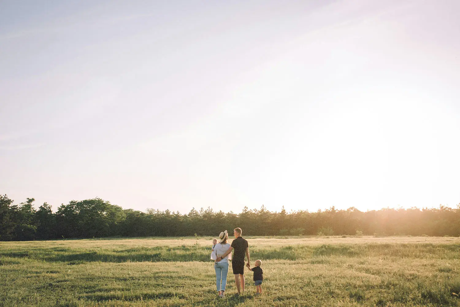 family walking in field