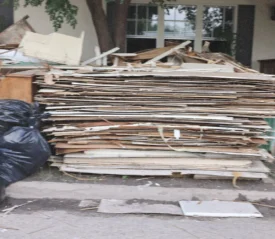 stack of damaged wall panels