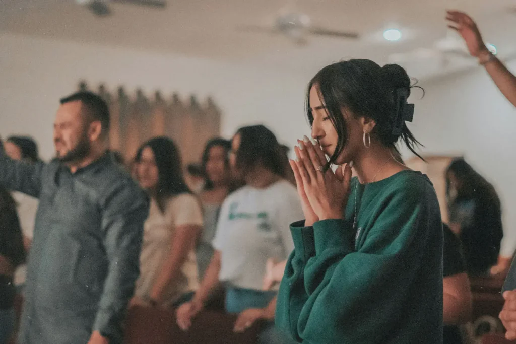Group of people in prayer and worship