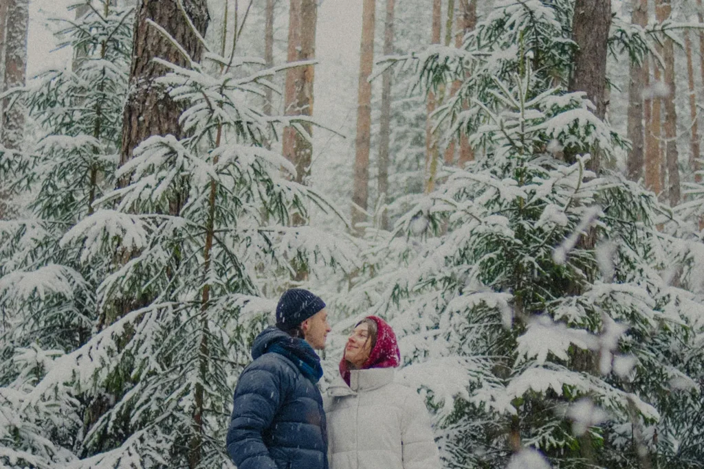 Couple standing in the snow