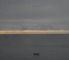 Single boat in the middle of the ocean