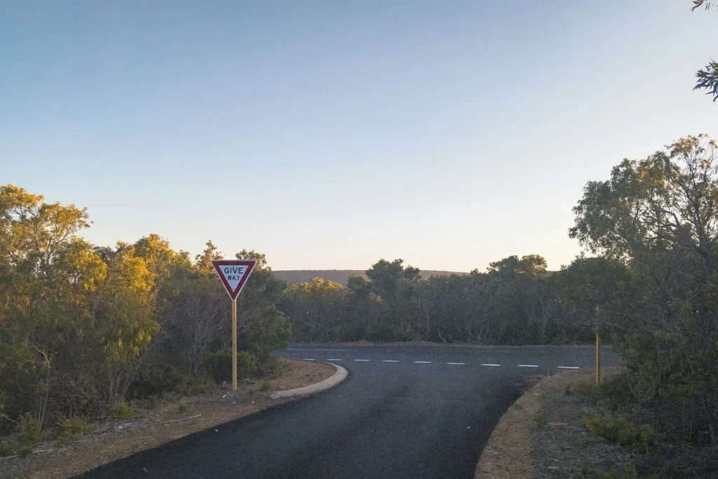 Empty road with a yield sign