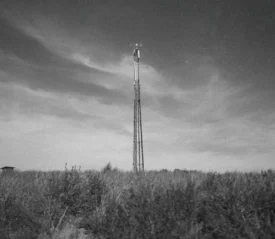 radio pole in an empty field
