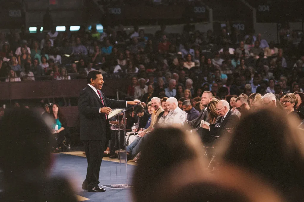 Minister speaking to an audience at Southwest Believers' Convention