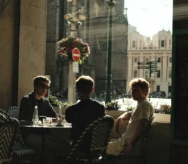 Group of men sitting at outdoor cafe