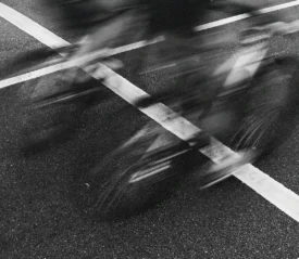 Blurry image of two bikers