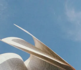 Open Bible pages turning by the wind