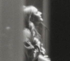 Girl lifting her head singing