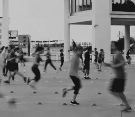 Group of athletes running drills