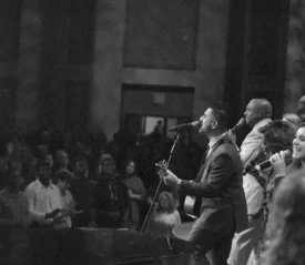 EMIC Worship team leading worship in front of congregation