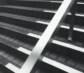 Steel rail and concrete staircase