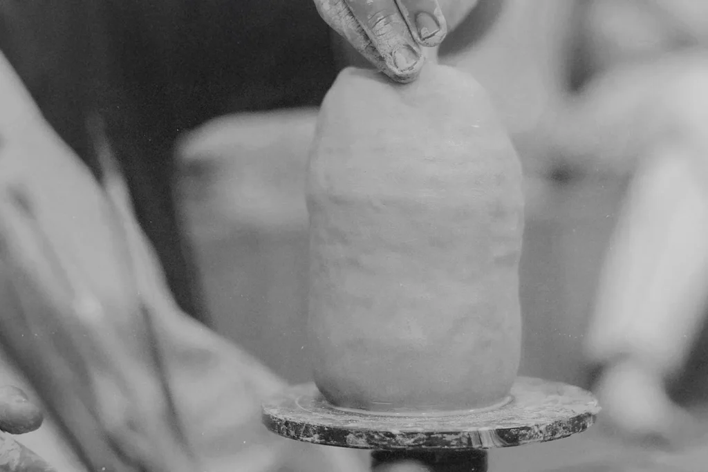 hand making clay pottery