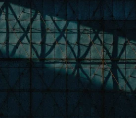 shadow on metal wall