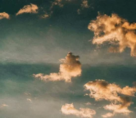 scattered clouds lit by sunlight