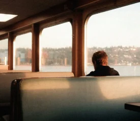 man sitting on train