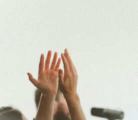 Two hands lifted in worship