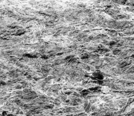 Kayak in the middle of rushing waters