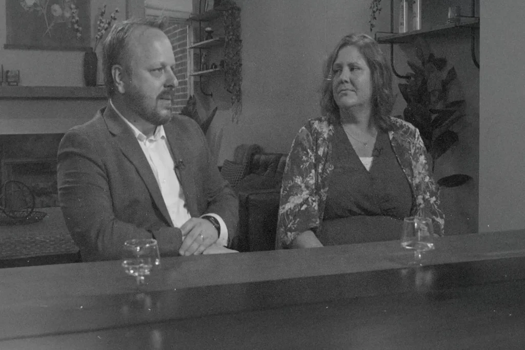 Chris and Sara Eberhardt sitting and talking