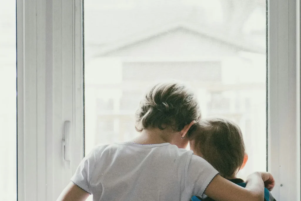 couple embracing in the doorway