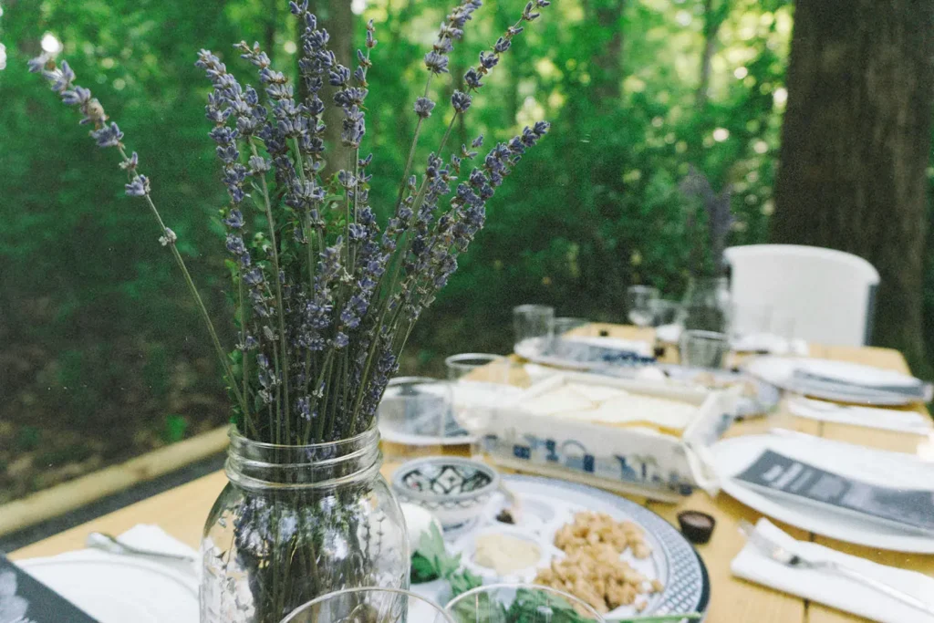 Table set with dining ware and a mason jar filled with lavender