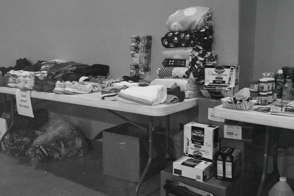 black and white photo of donations on a table