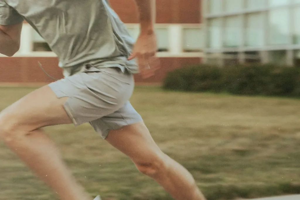Person running on the sidewalk