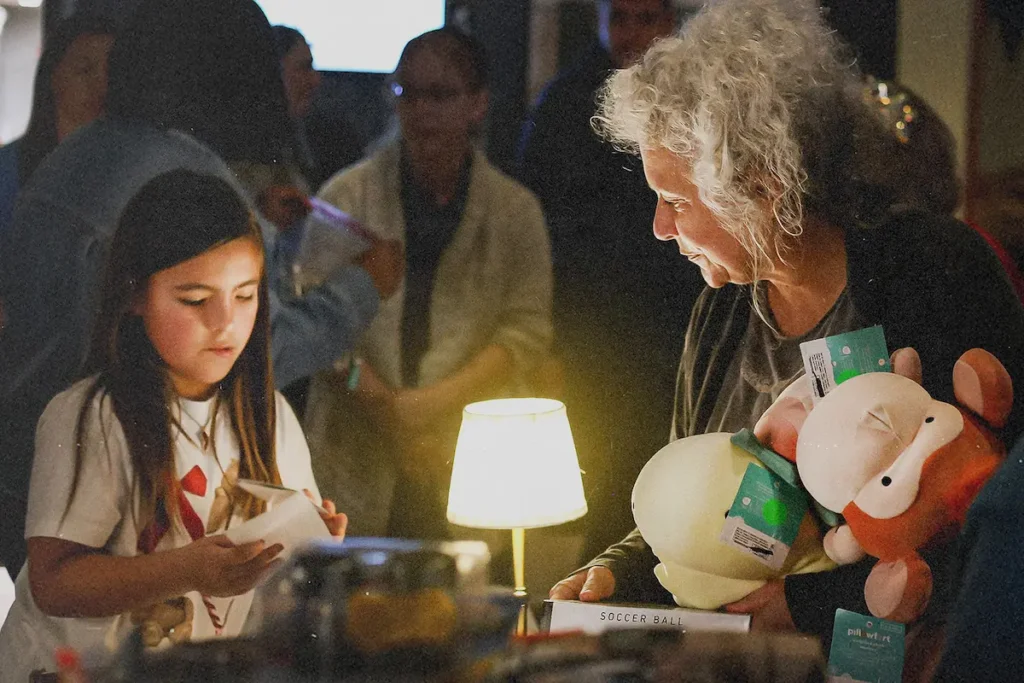 Volunteers helping sort through donated toys at the outreach for Christmas in Kerrville, Texas.