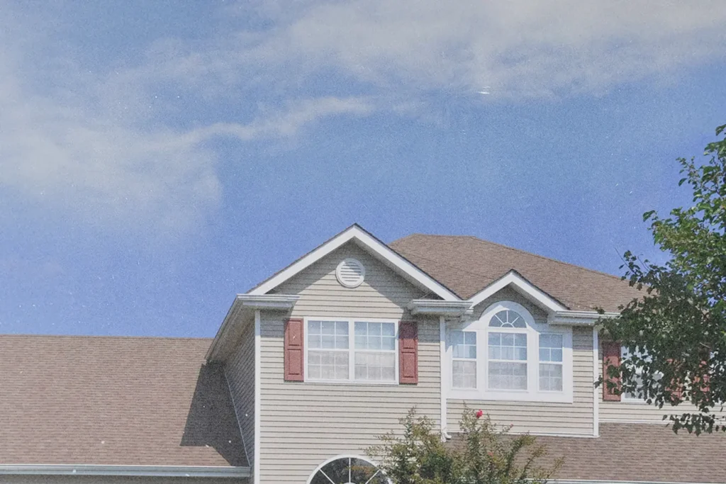 A two-story home looking to the sky