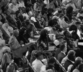 people at convention reading bibles