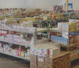 Stocked grocery shelves inside The Joseph Storehouse, a community outreach ministry supported by Kenneth Copeland Ministries to help families access affordable food.
