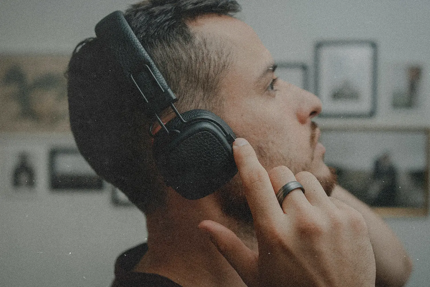 Person wearing headphones, symbolizing listening for God’s voice through prayer, Scripture, and spiritual awareness in a growing relationship with God