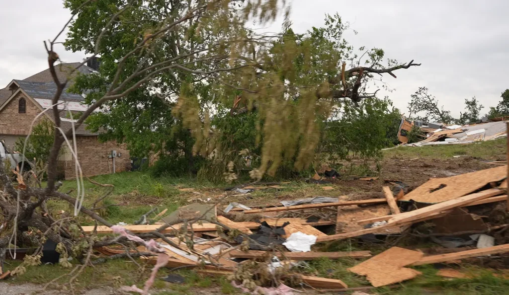 The damage left from a tornado in Springtown, Texas taken by KCM Disaster Relief
