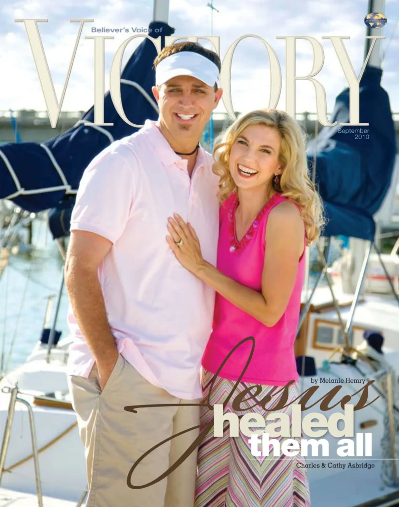 A magazine cover titled “VICTORY” featuring two individuals standing on a docked boat with the headline “Jesus Healed Them All.”