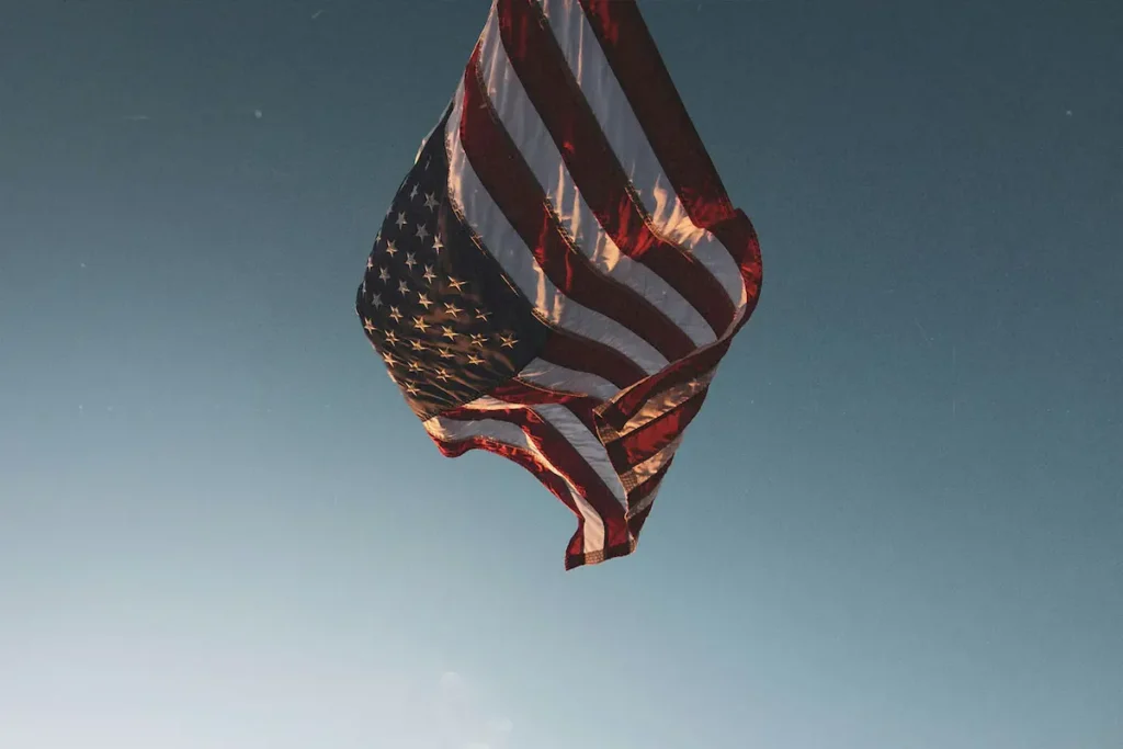 An American flag against the sky