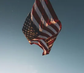 An American flag against the sky