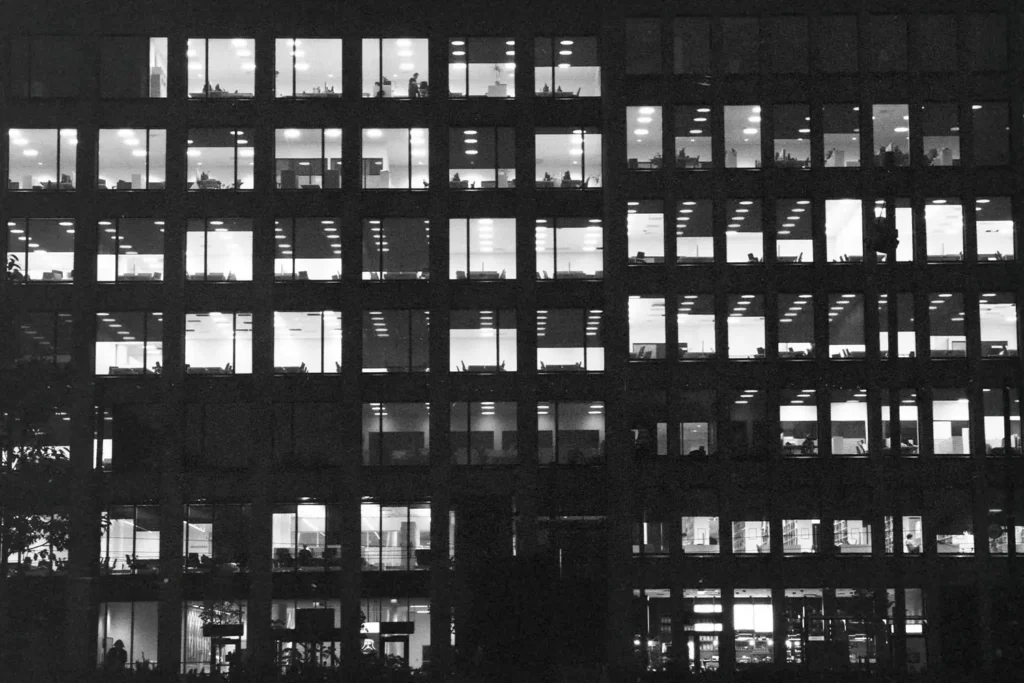 View of windows of a commercial office building from the street