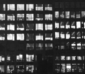 View of windows of a commercial office building from the street