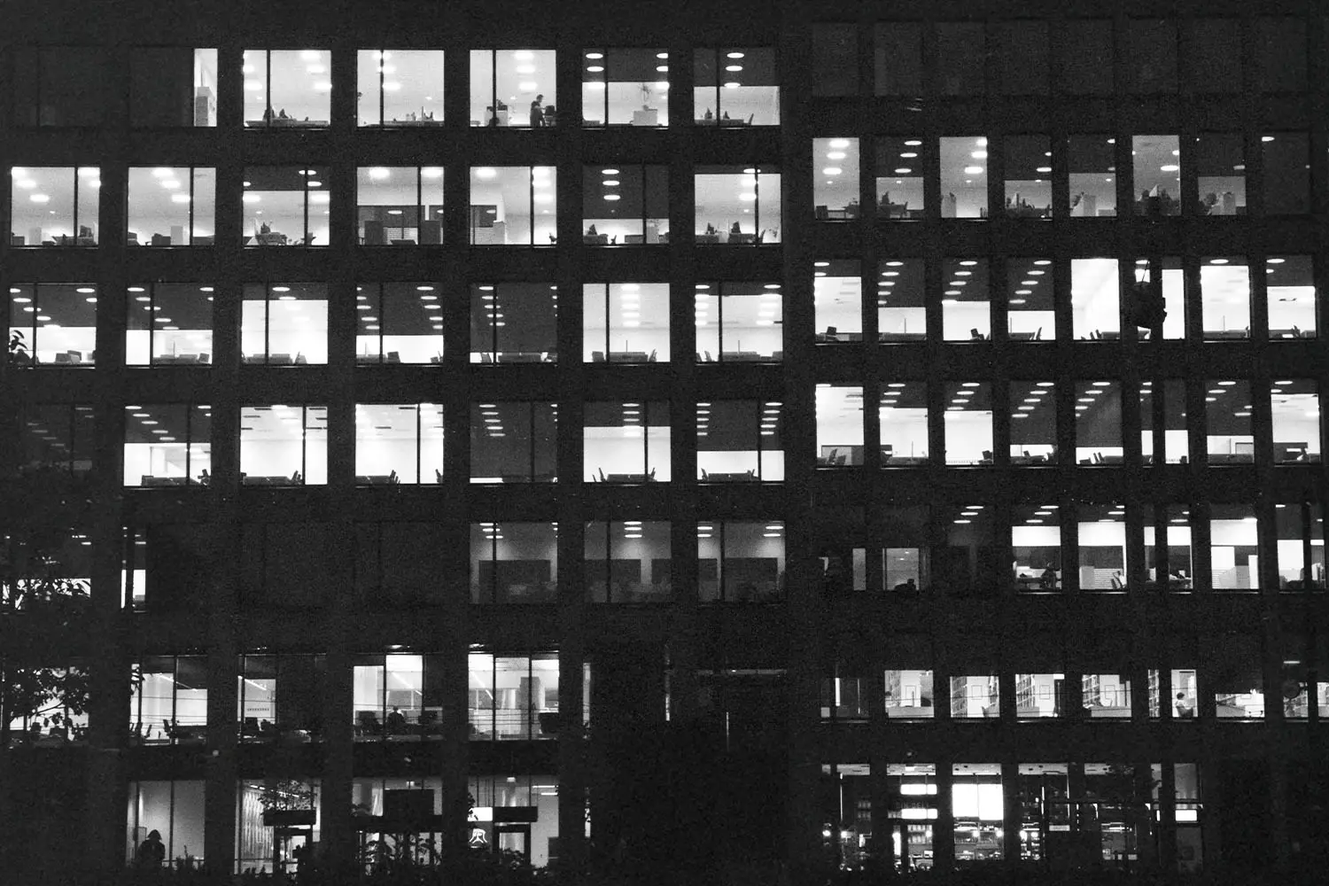 View of windows of a commercial office building from the street