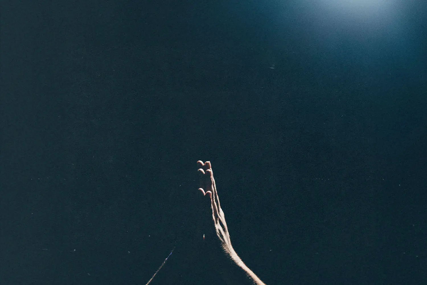 Palms faced closed in praying position