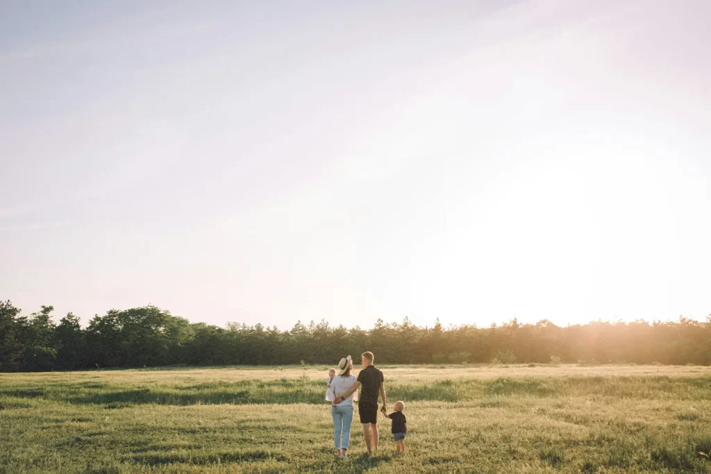 family walking in field