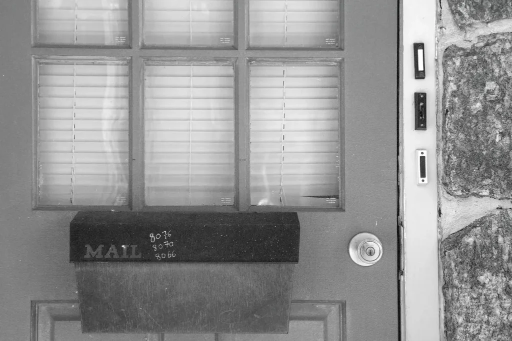 Mail box on the front door with doorbell