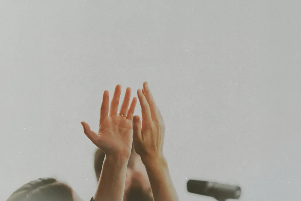 hands in the air praising