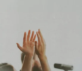hands in the air praising