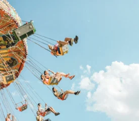 Ground-view of people riding Swing Ride
