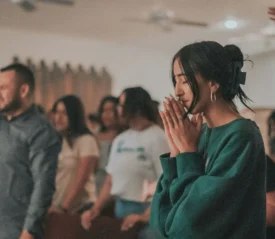 Group of people in prayer and worship