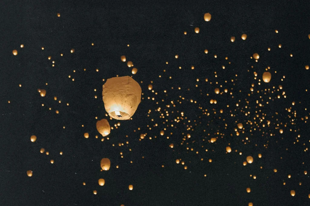 lanterns floating in the night sky