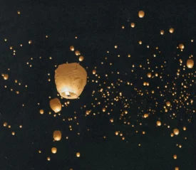 lanterns floating in the night sky