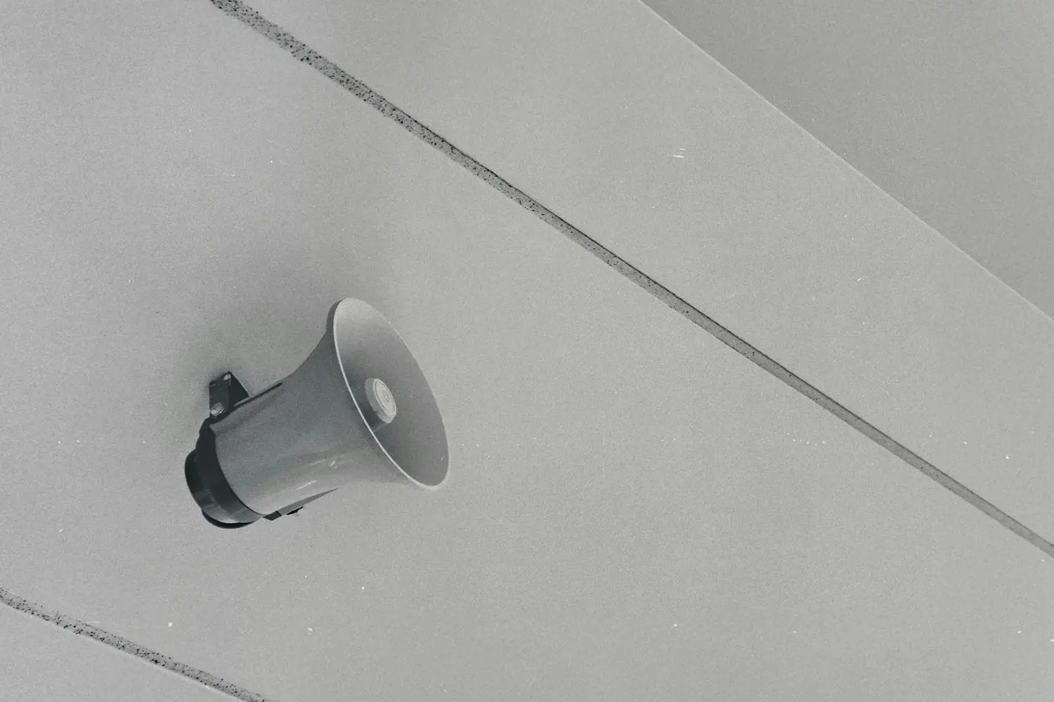 white speaker of white wall